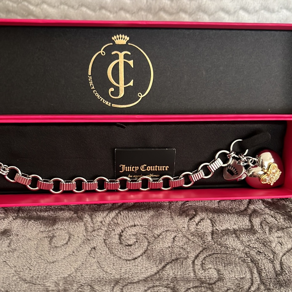 Juicy couture bracelet with attached heart charm